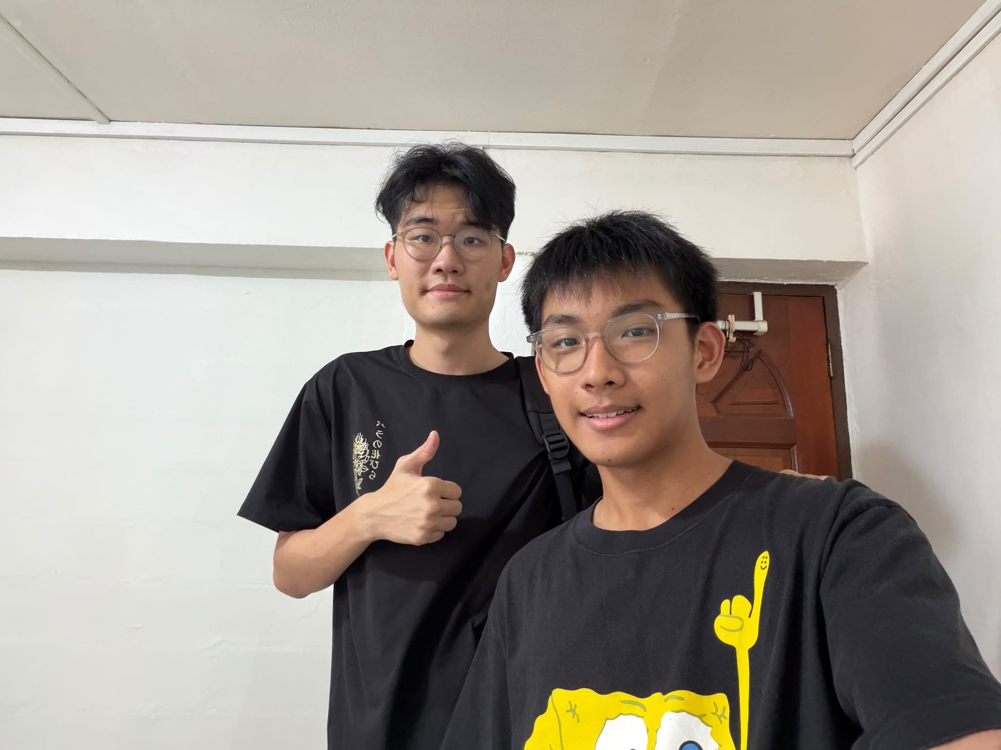 Titan with one of his students after the student graduated